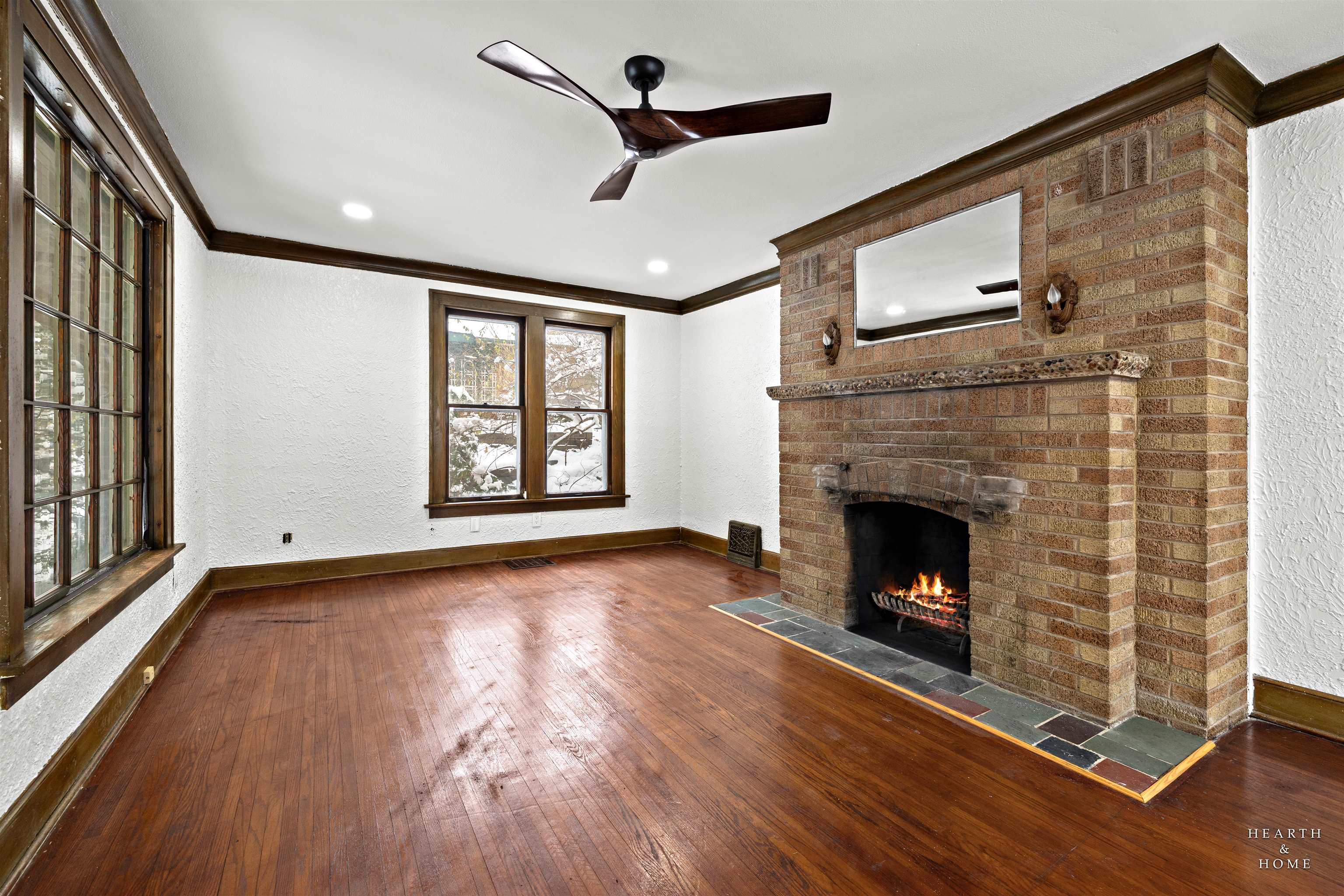 1016 B Street Rockford, IL 61107 - Photo 29 of 38 a view of empty room with wooden floor and fireplace