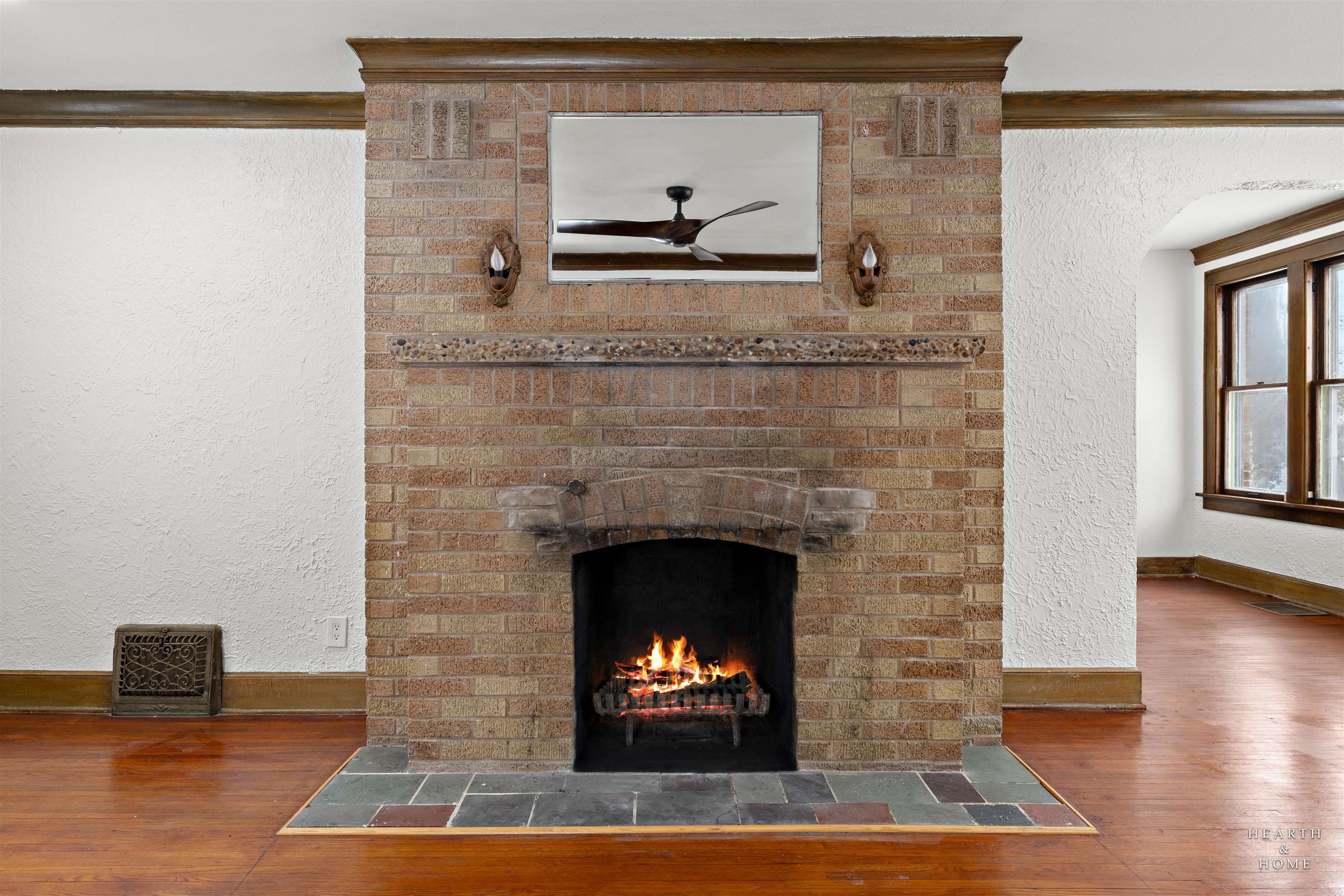1016 B Street Rockford, IL 61107 - Photo 31 of 38 a living room with a fireplace and a rug