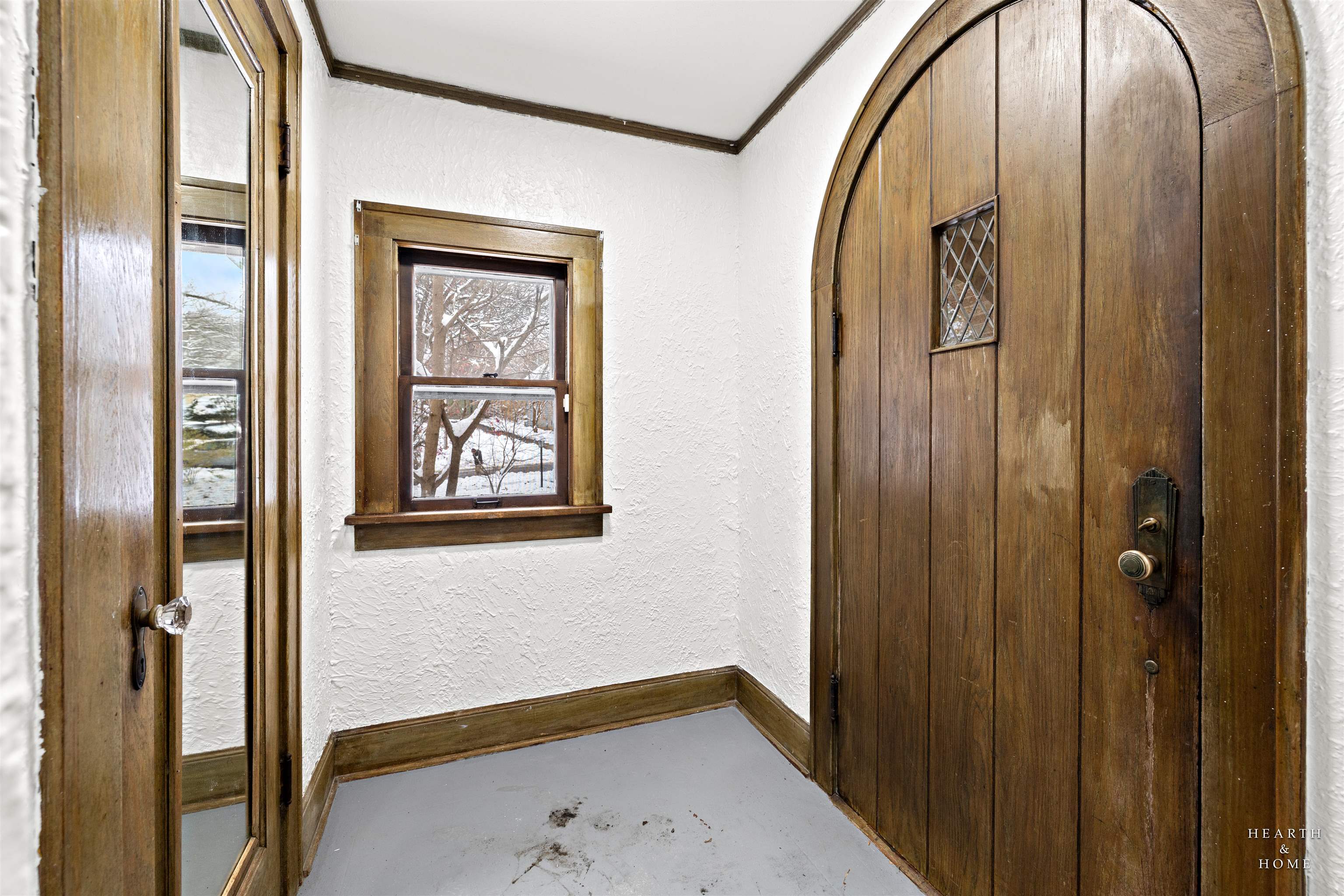 1016 B Street Rockford, IL 61107 - Photo 37 of 38 a bathroom with a mirror and a shower