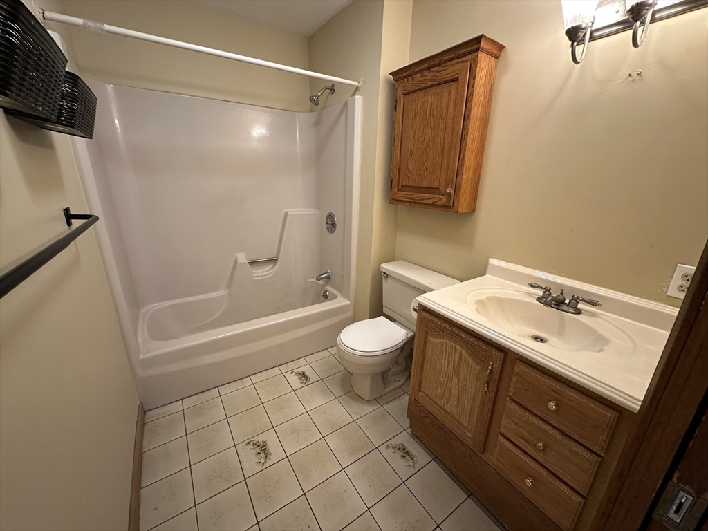 124 Barrington Road Longmeadow, MA 01106 - Photo 10 of 13 a bathroom with a sink a toilet and shower