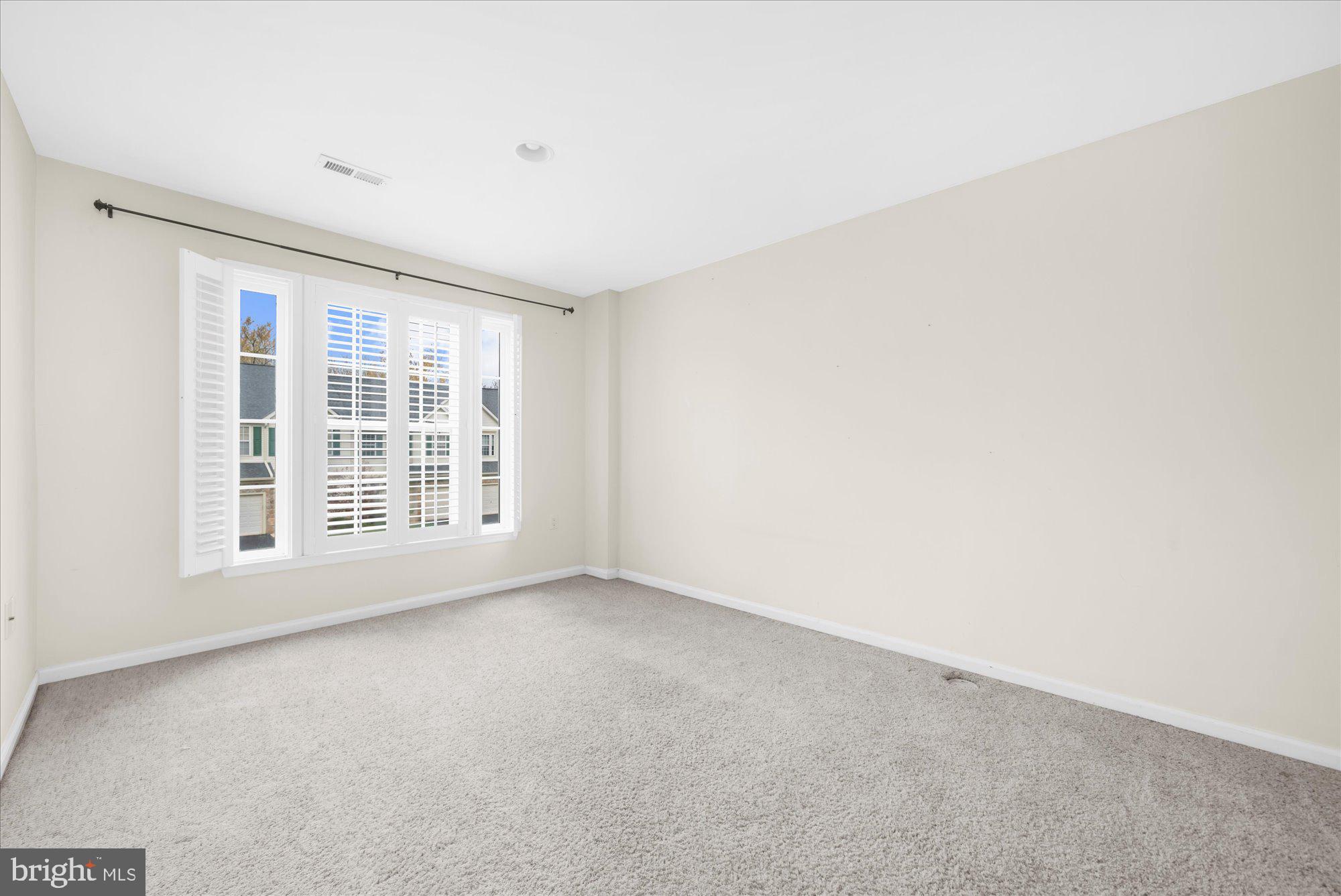 813 Geranium Drive Warrington, PA 18976 - Photo 23 of 44 a view of an empty room with a window