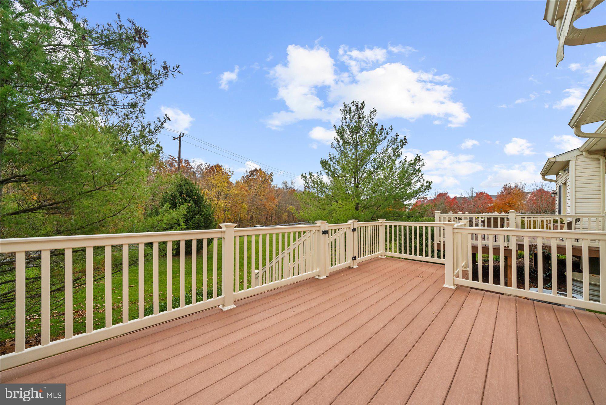 813 Geranium Drive Warrington, PA 18976 - Photo 36 of 44 a balcony with wooden floor and fence