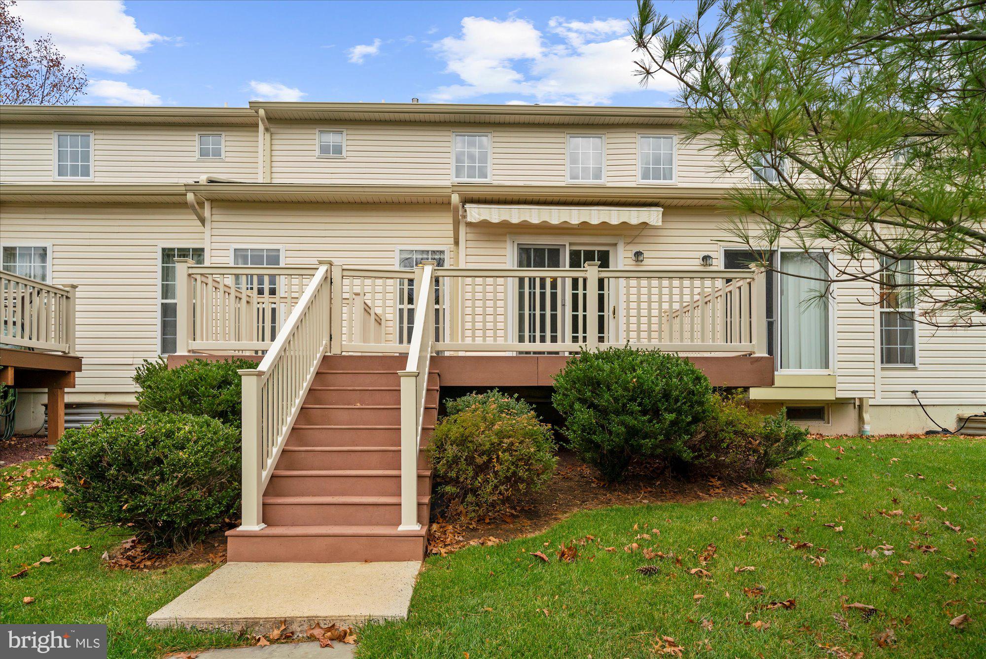 813 Geranium Drive Warrington, PA 18976 - Photo 37 of 44 a front view of a house with a yard and potted plants