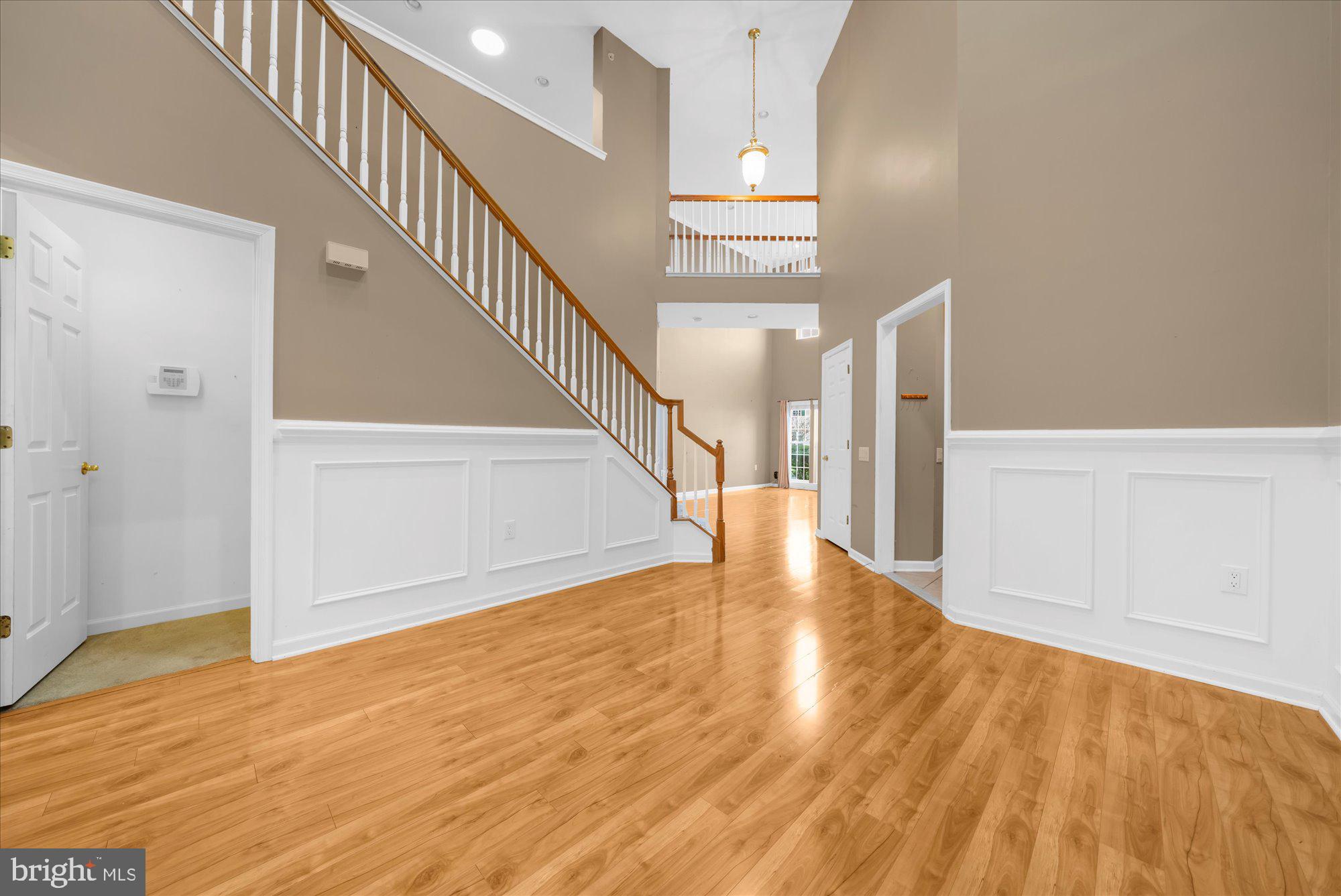 813 Geranium Drive Warrington, PA 18976 - Photo 8 of 44 a view of entryway and hall with wooden floor