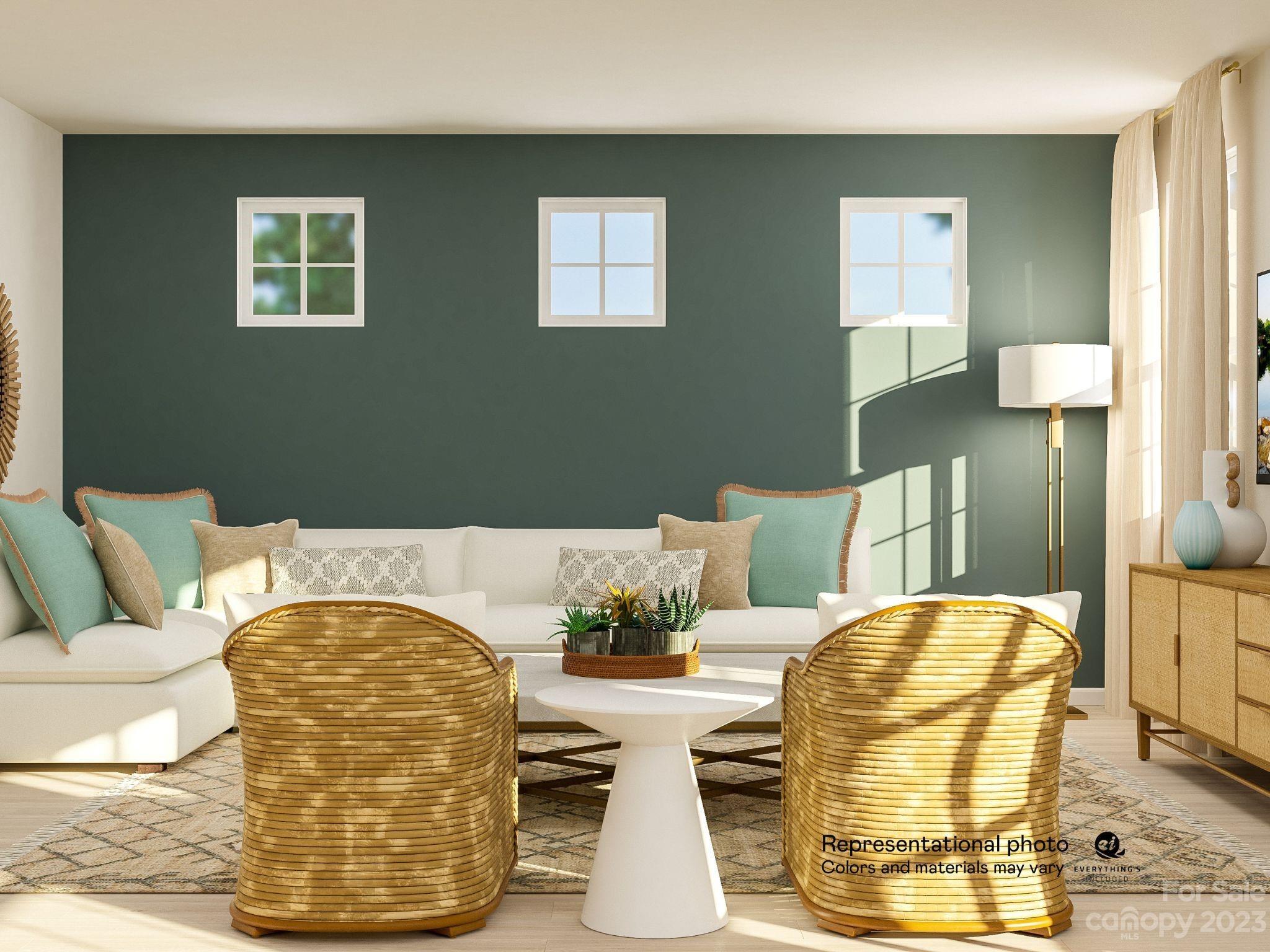 a living room with furniture and a lamp