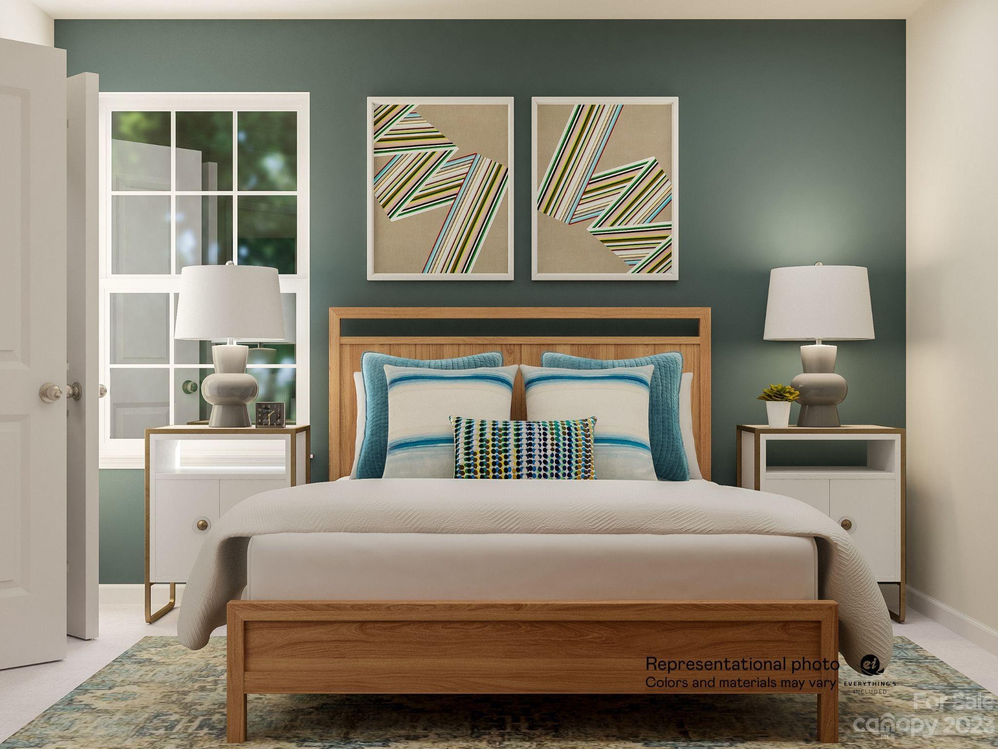 5836 Soft Shell Drive, Unit 286 Lancaster, SC 29720 - Photo 9 of 20 a bedroom with a bed and a painting on the wall