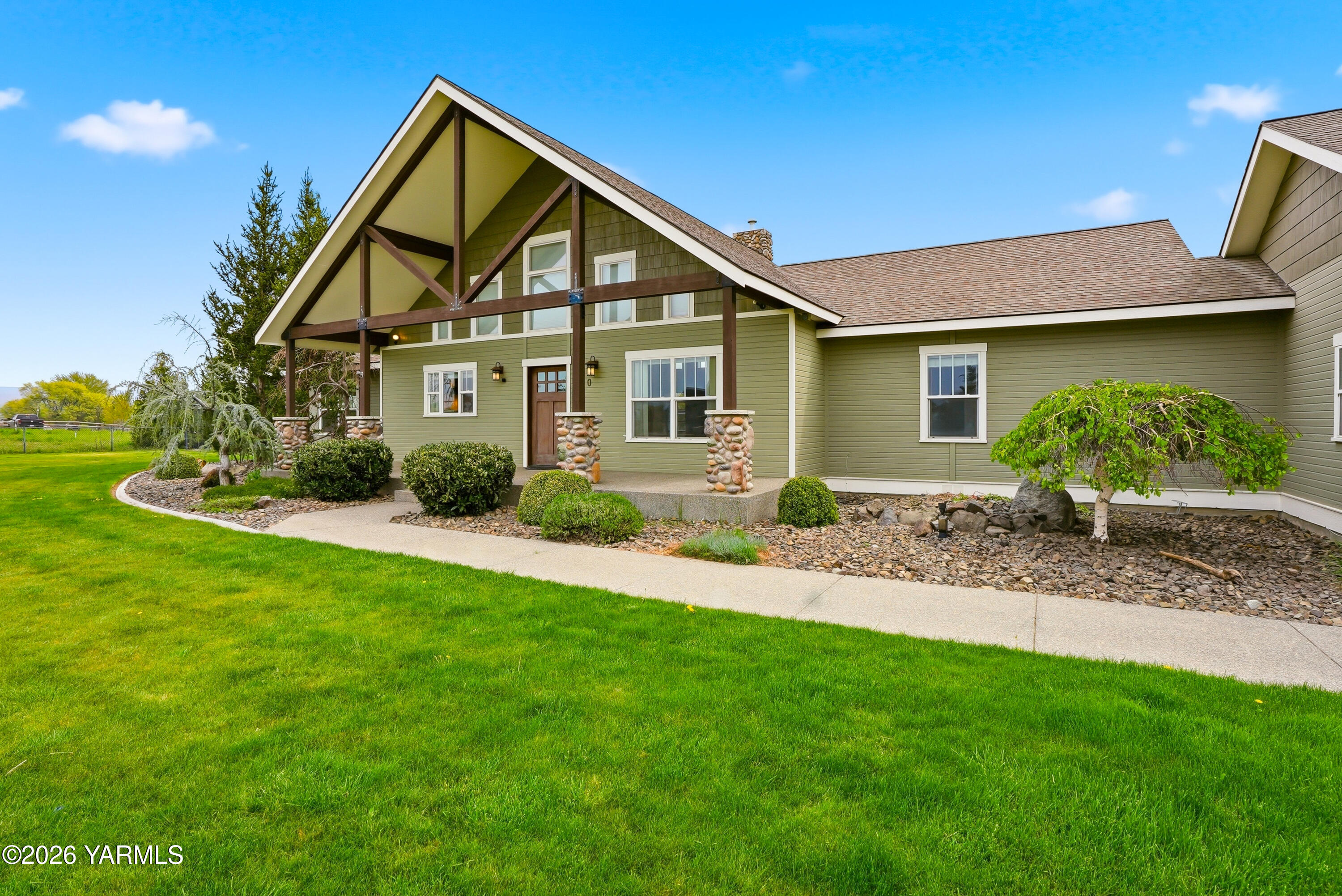 230 Albro Road Sunnyside, WA 98944 - Photo 3 of 46 a view of a house with a yard