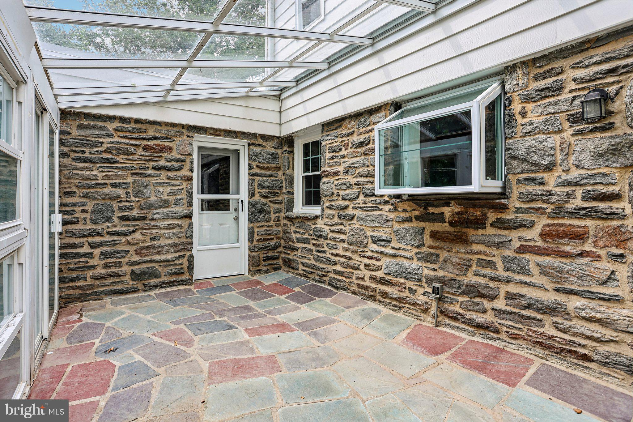 1020 Church Road Wyncote, PA 19095 - Photo 44 of 49 ...an atrium provides comfortable outdoor living..