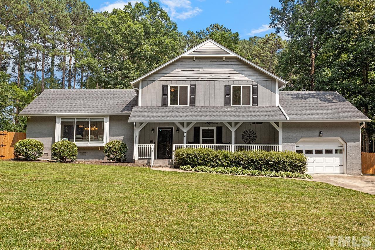 124 Bayleaf Drive Raleigh, NC 27615 - Photo 1 of 40 a front view of a house with a yard