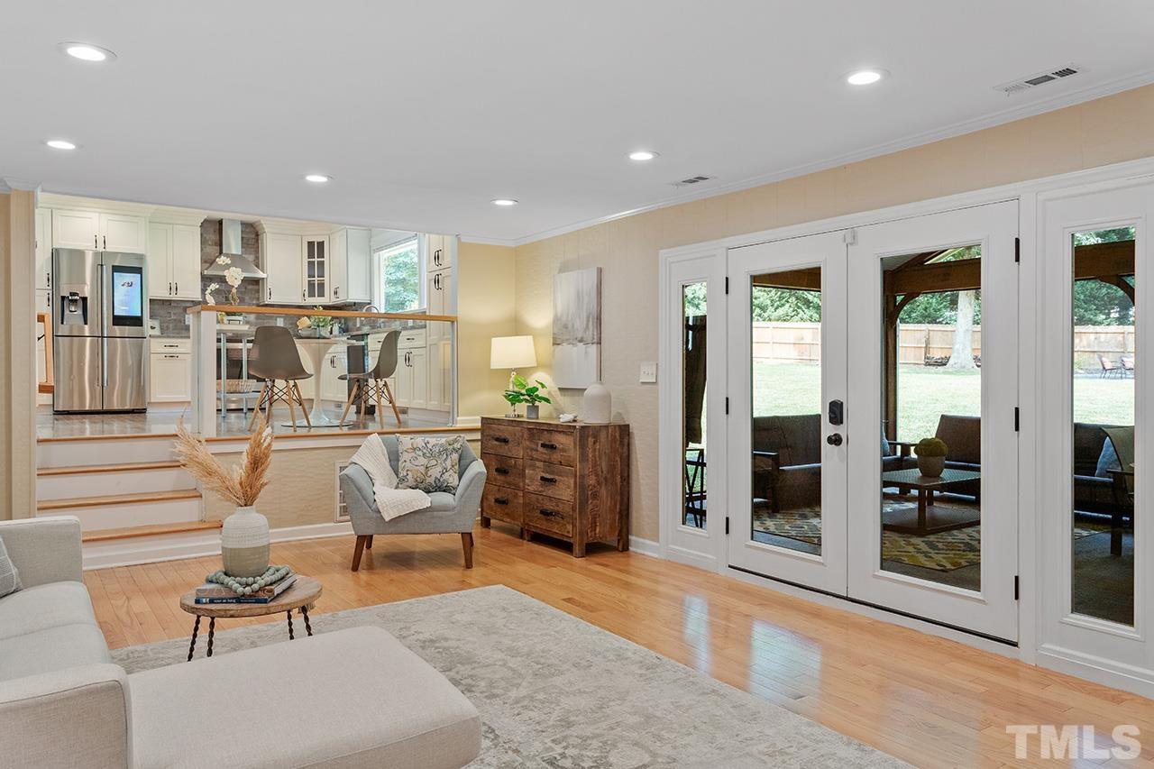 124 Bayleaf Drive Raleigh, NC 27615 - Photo 24 of 40 a living room with furniture and large windows