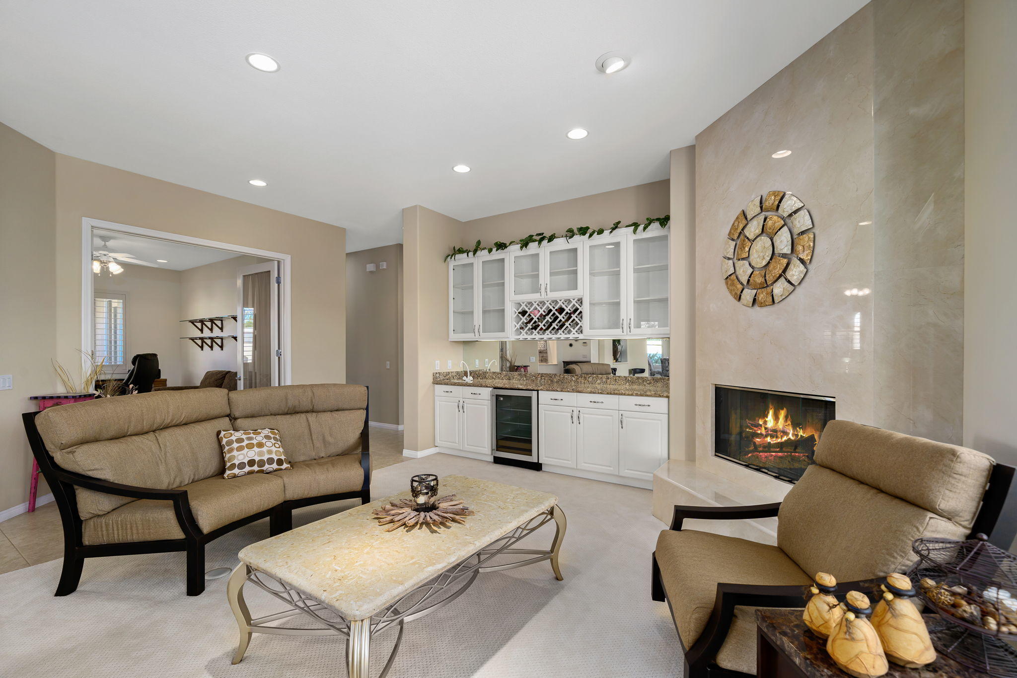 1 Orleans Road Rancho Mirage, CA 92270 - Photo 17 of 50 a living room with furniture and fireplace