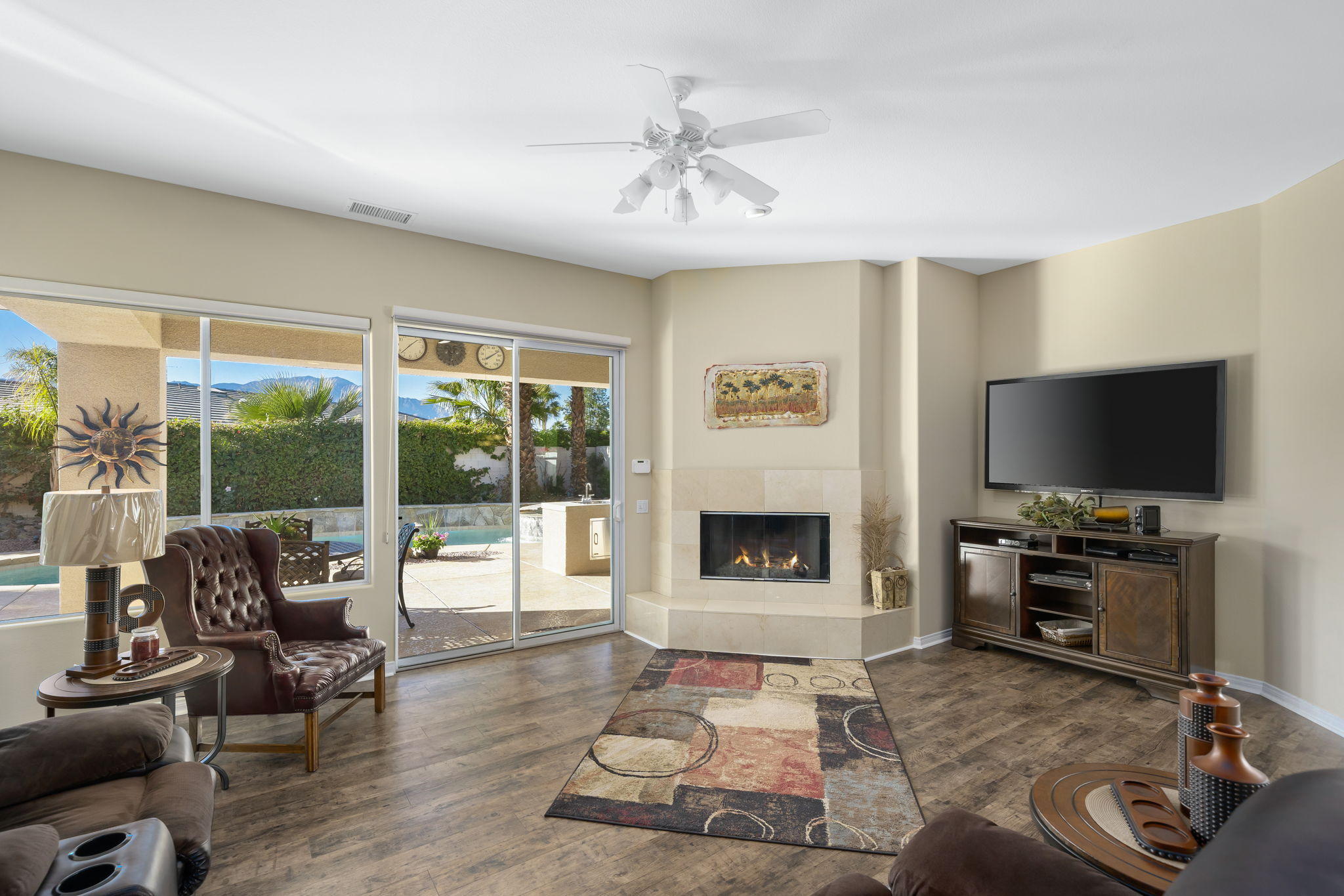 1 Orleans Road Rancho Mirage, CA 92270 - Photo 21 of 50 a living room with furniture and a flat screen tv