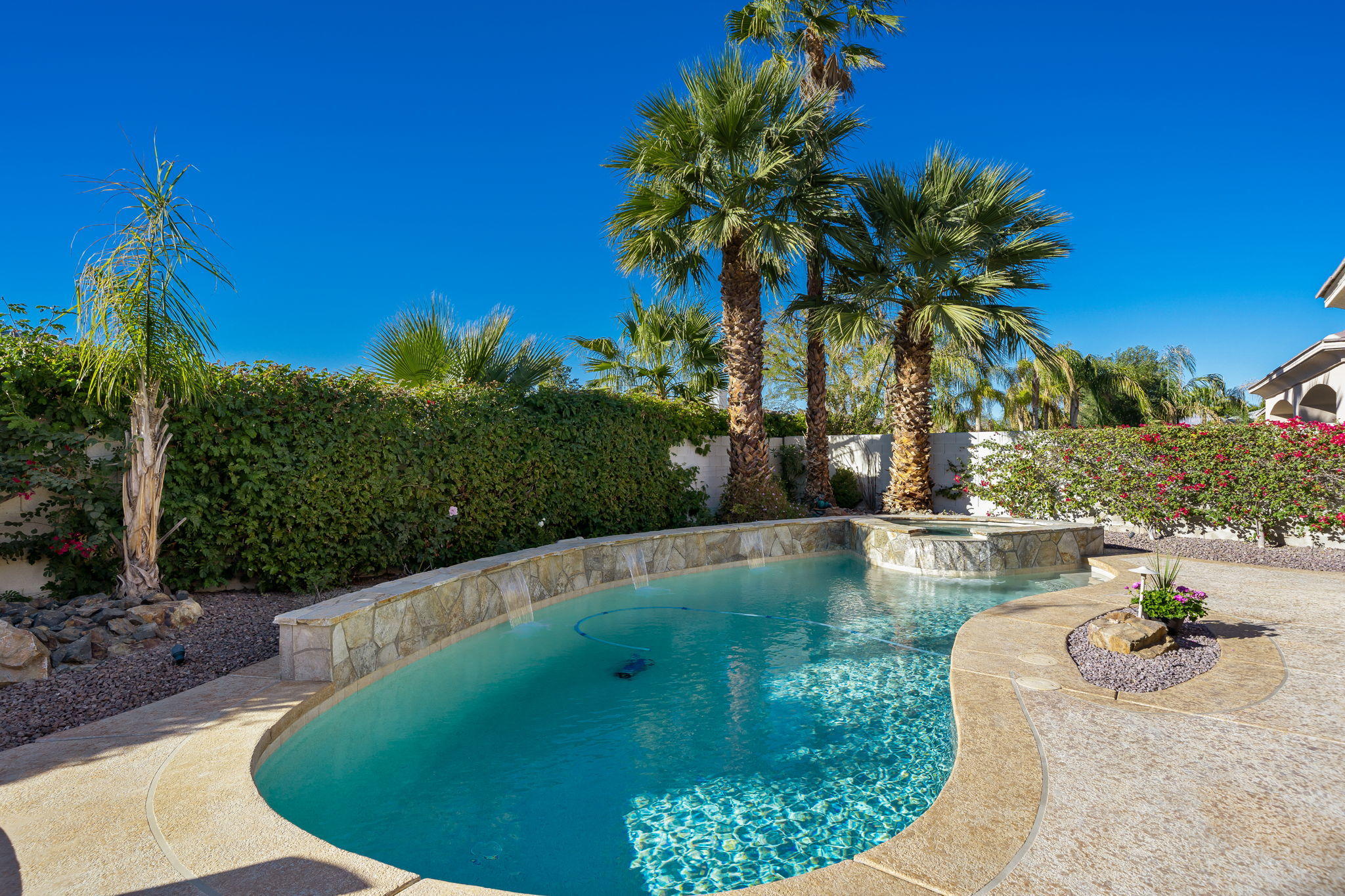 1 Orleans Road Rancho Mirage, CA 92270 - Photo 35 of 50 a view of a swimming pool with a patio
