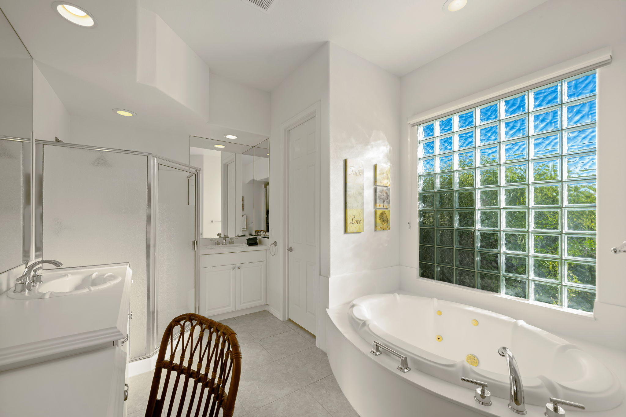 1 Orleans Road Rancho Mirage, CA 92270 - Photo 42 of 50 a bathroom with a bathtub and a sink