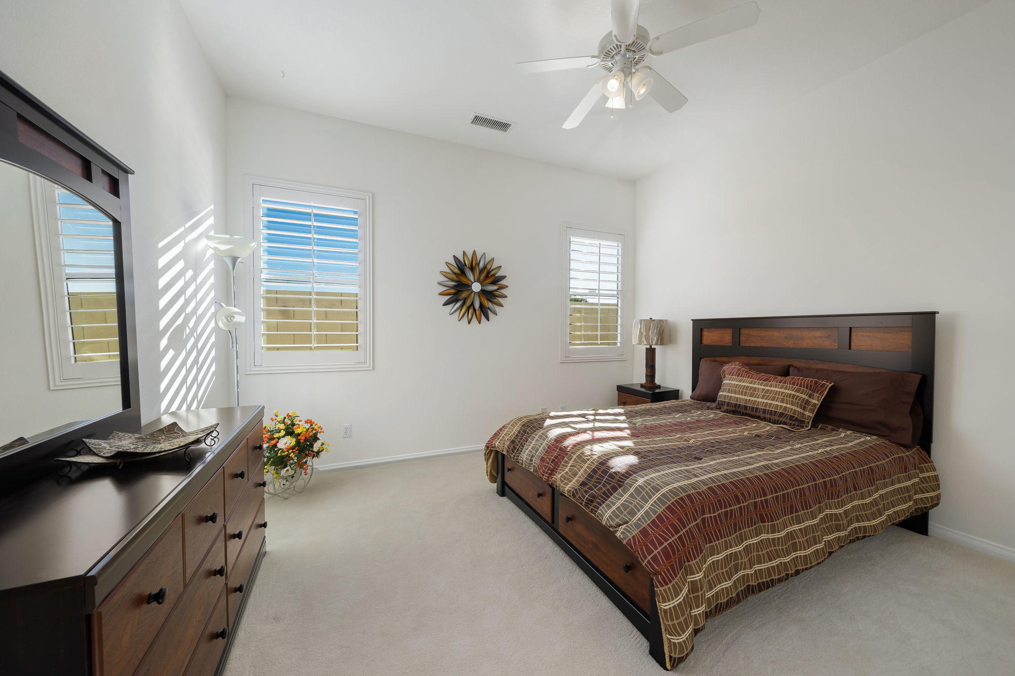 1 Orleans Road Rancho Mirage, CA 92270 - Photo 44 of 50 a bedroom with a bed dresser and a window