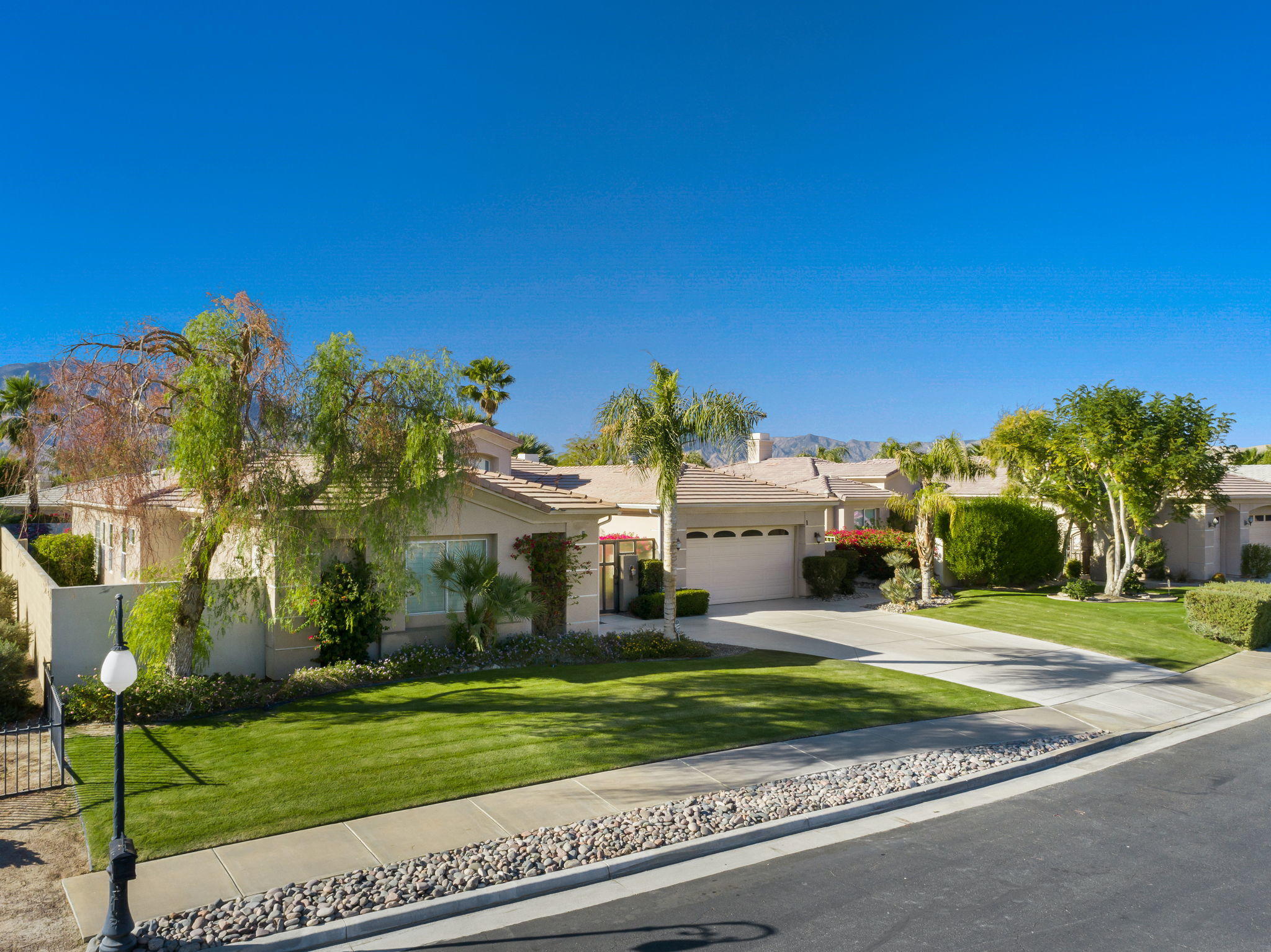 1 Orleans Road Rancho Mirage, CA 92270 - Photo 9 of 50 a view of a house with a yard