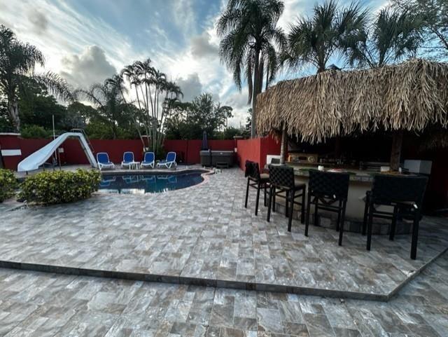 5800 Pine Tree Road Parkland, FL 33067 - Photo 24 of 35 a view of outdoor space yard and patio