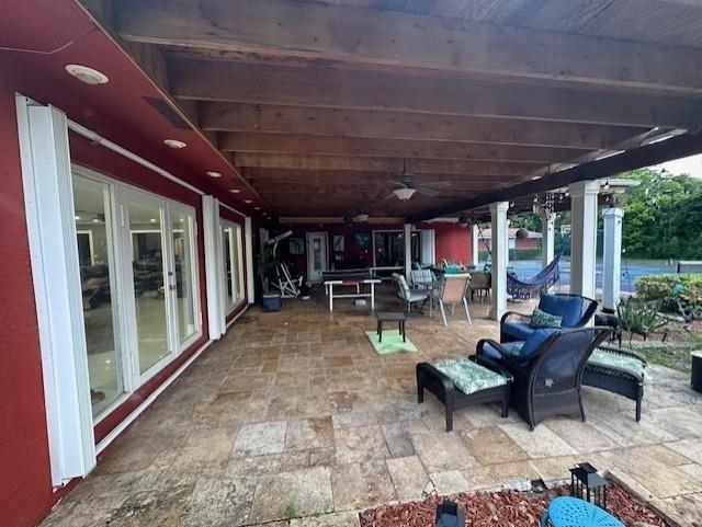 5800 Pine Tree Road Parkland, FL 33067 - Photo 25 of 35 a building outdoor space with patio furniture and potted plants