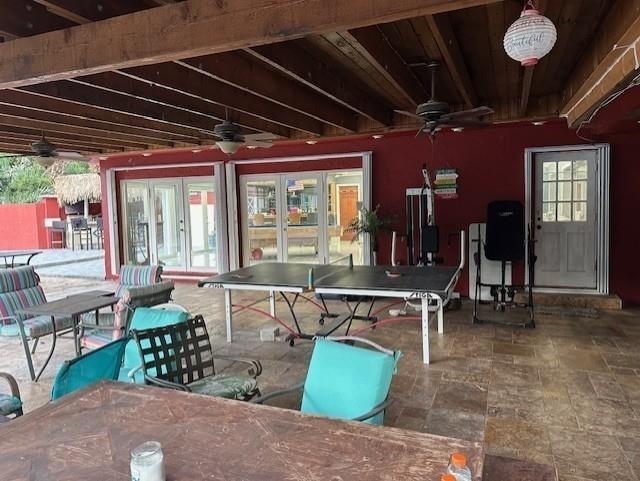 5800 Pine Tree Road Parkland, FL 33067 - Photo 26 of 35 a view of a patio with table and chairs