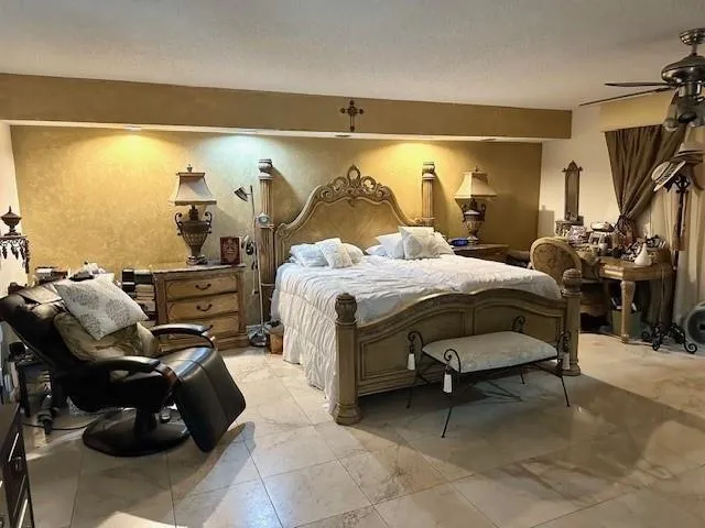 a living room with a couch and a stove top oven