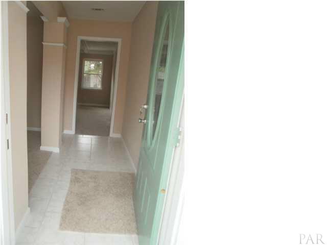 5185 Flax Road Pensacola, FL 32504 - Photo 3 of 25 Come in and take a look at this newly renovated home. Foyer has tile flooring.