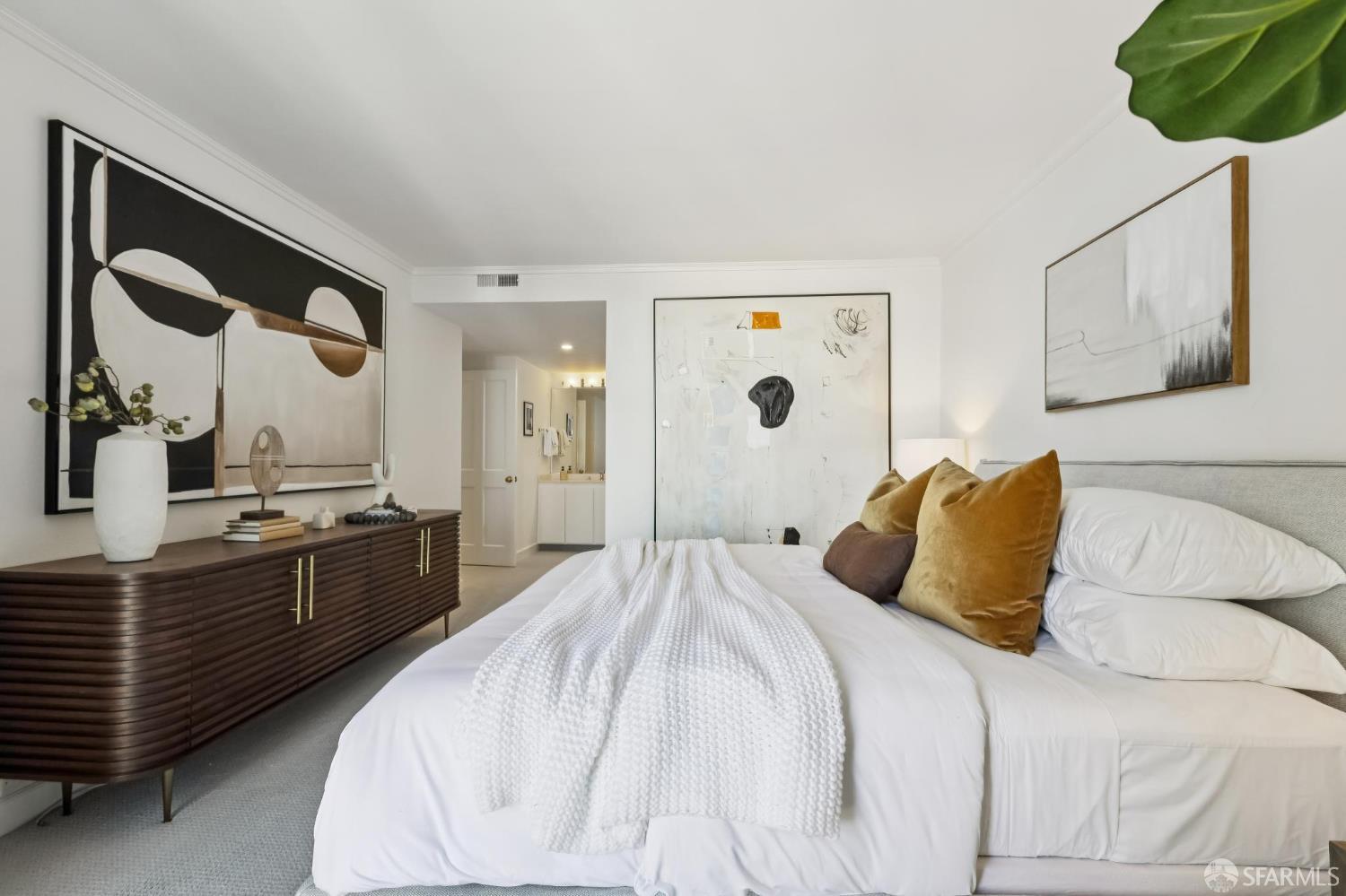 150 Lombard Street, Unit 807 San Francisco, CA 94111 - Photo 34 of 68 a large white bed in a white room