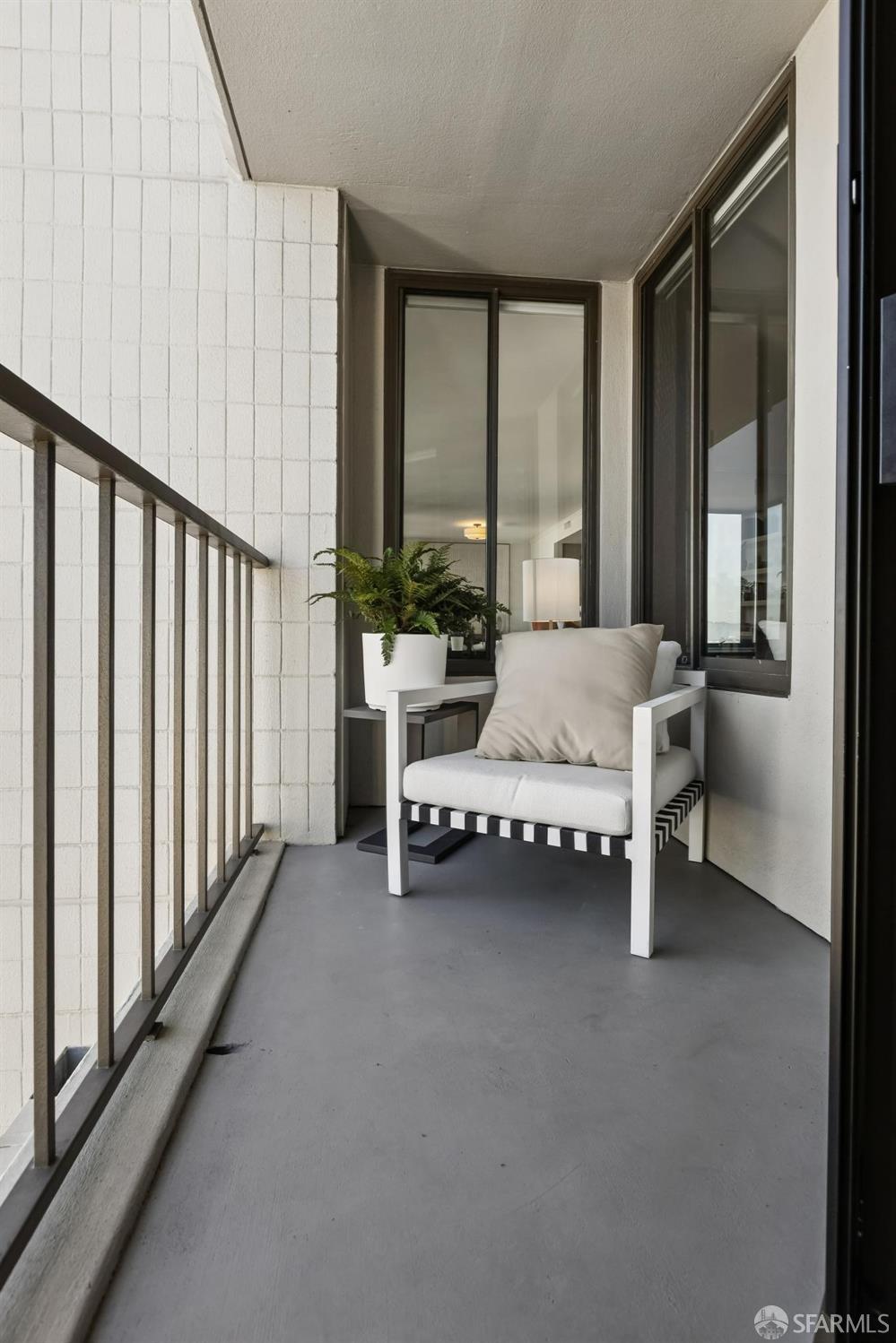 150 Lombard Street, Unit 807 San Francisco, CA 94111 - Photo 41 of 68 a living room with furniture and a large window
