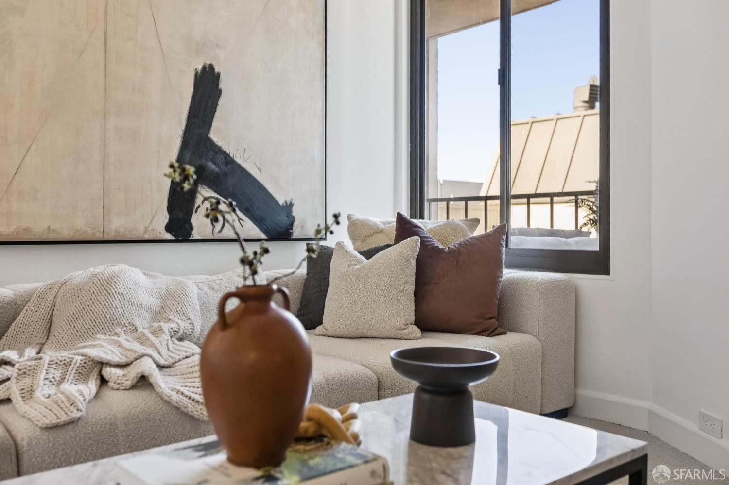 150 Lombard Street, Unit 807 San Francisco, CA 94111 - Photo 45 of 68 a living room with furniture and a large window