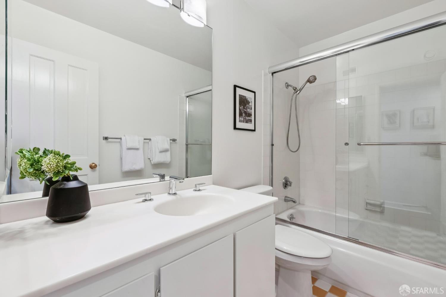 150 Lombard Street, Unit 807 San Francisco, CA 94111 - Photo 50 of 68 a bathroom with a sink a toilet and shower