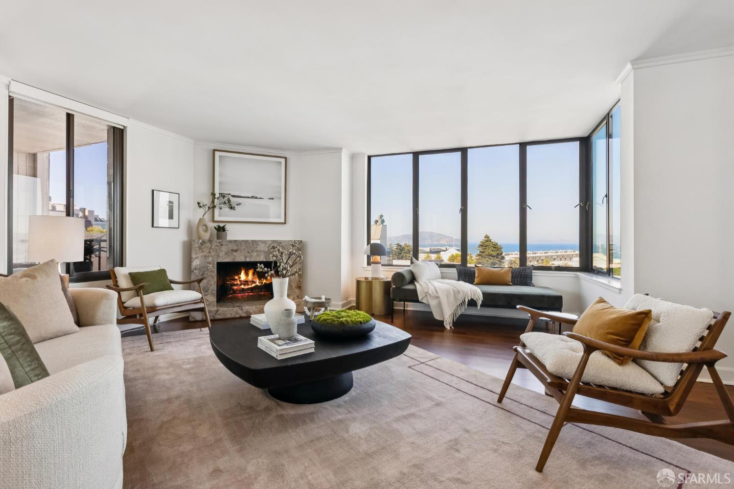 150 Lombard Street, Unit 807 San Francisco, CA 94111 - Photo 6 of 68 a living room with furniture fireplace and a large window