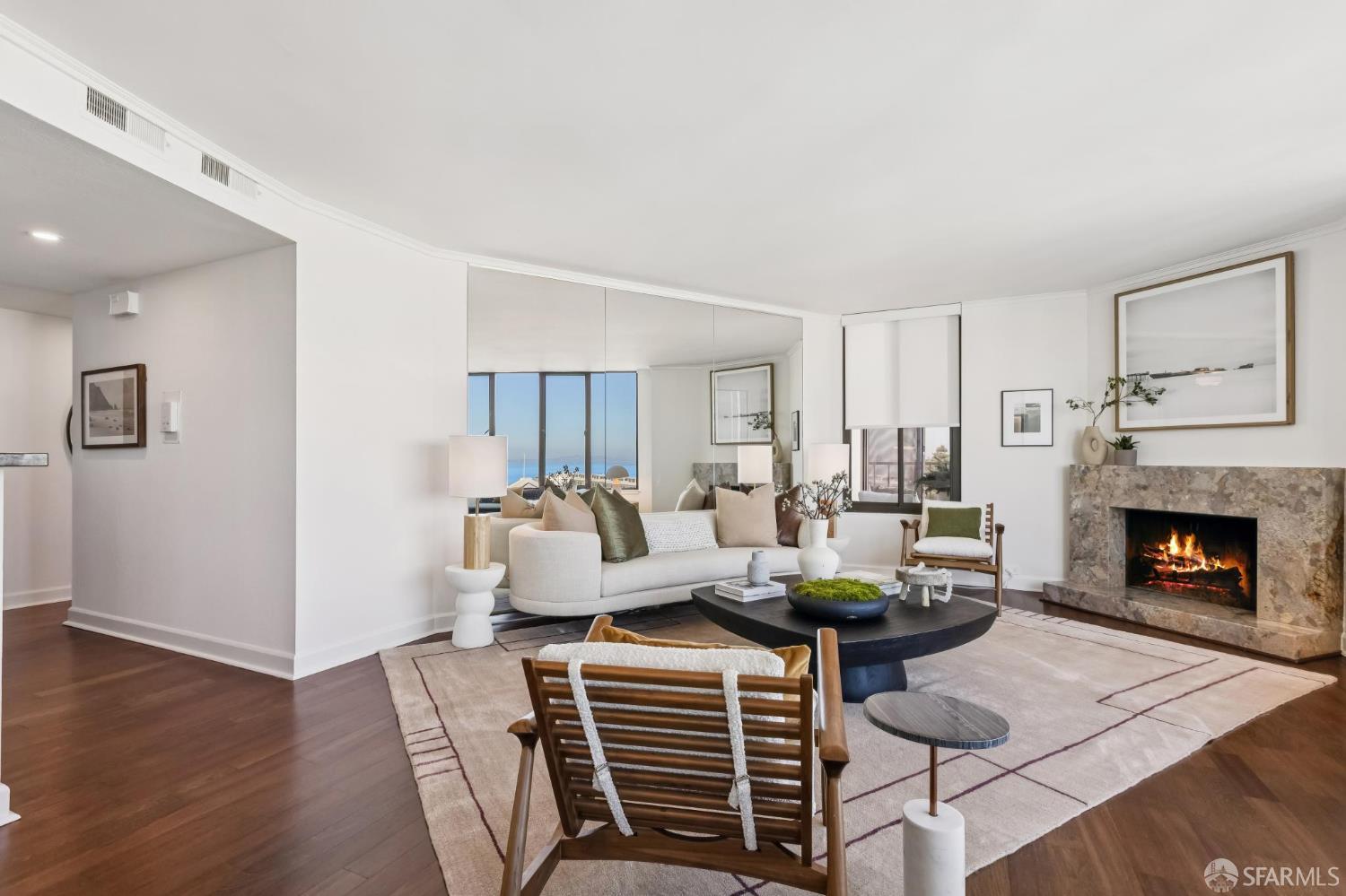 150 Lombard Street, Unit 807 San Francisco, CA 94111 - Photo 8 of 68 a living room with furniture a fireplace and wooden floor