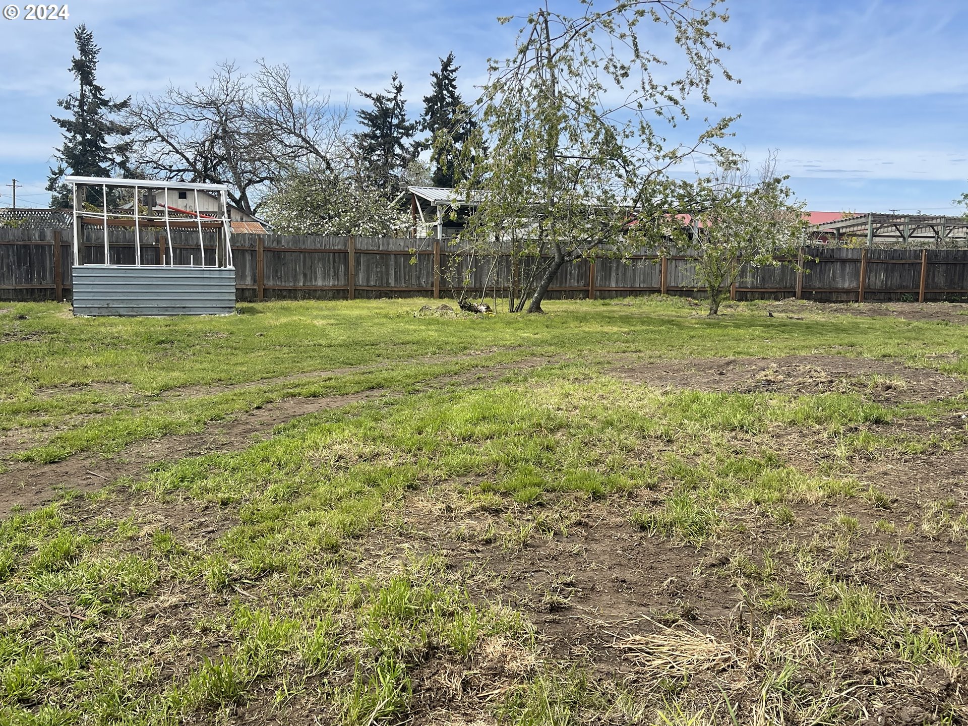 4530 Aster Street Springfield, OR 97478 - Photo 4 of 10 a view of a house with a yard