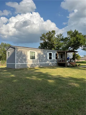 a view of a house with a swimming pool
