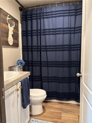a view of a living room and dining room