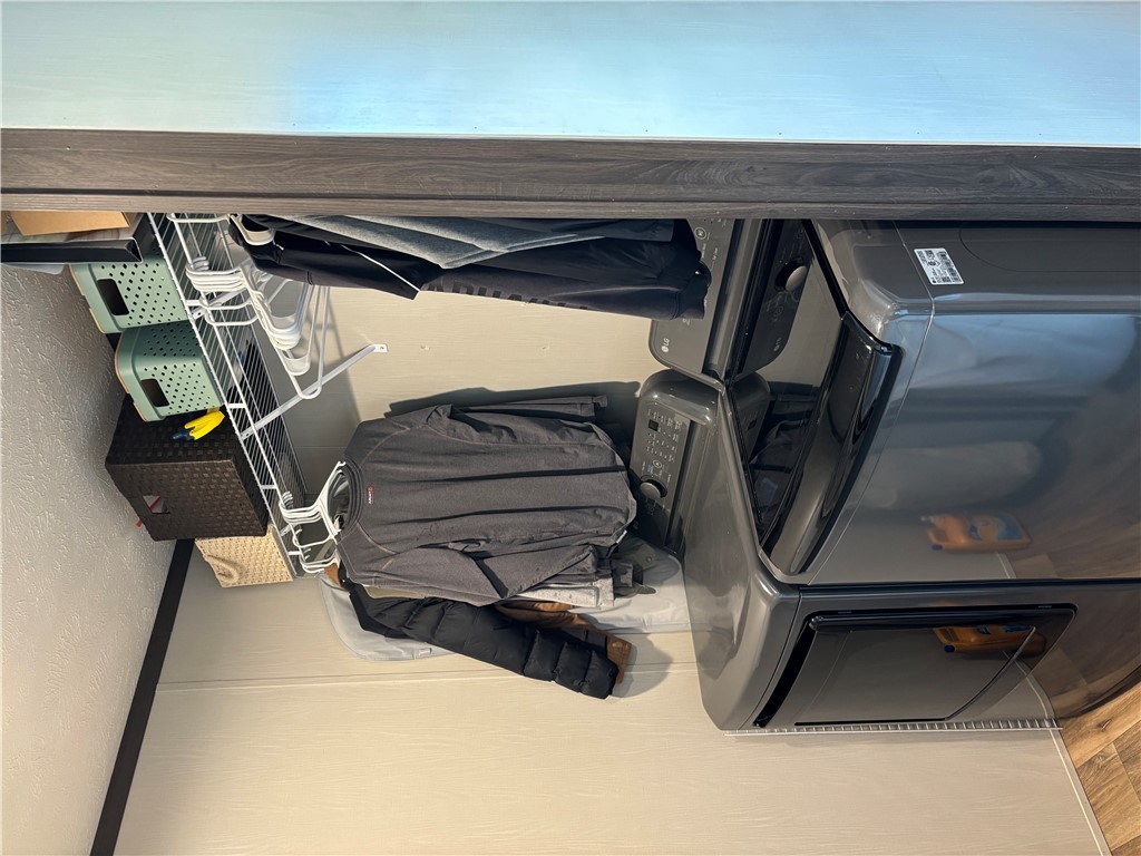 101 Edwards Street Franklin, TX 77856 - Photo 14 of 15 a utility room with dryer and washer