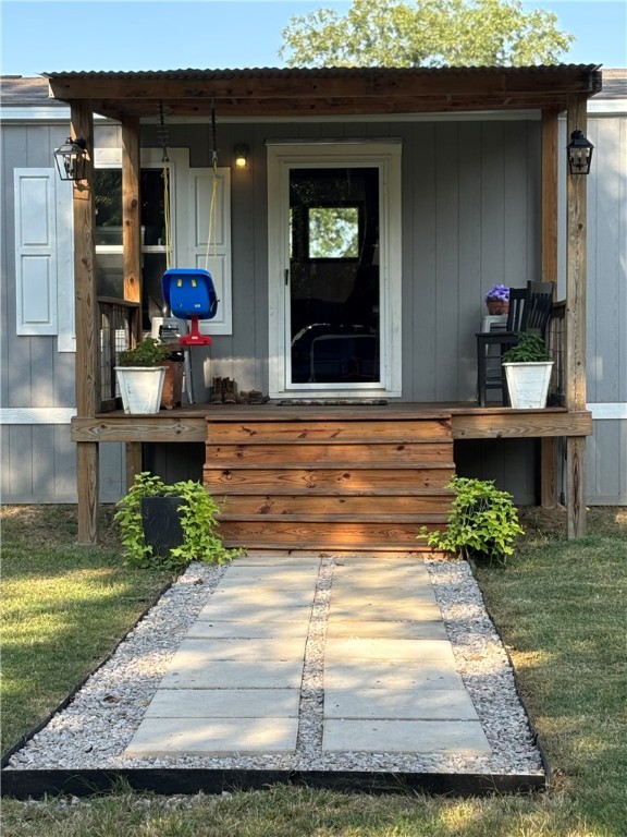 101 Edwards Street Franklin, TX 77856 - Photo 2 of 15 a view of front door and small yard