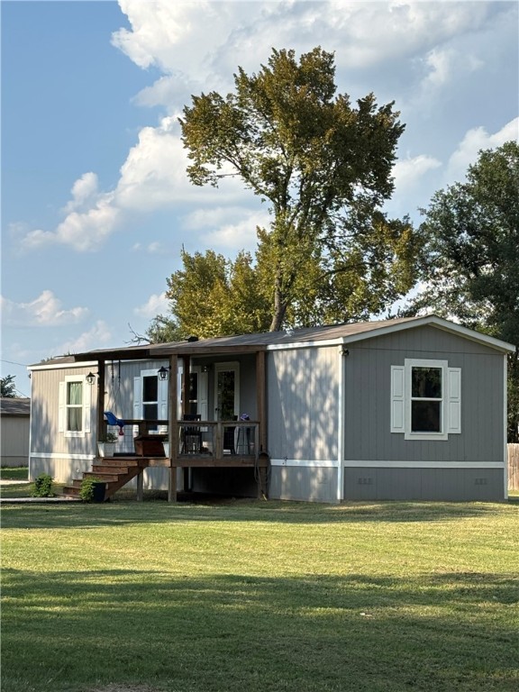 101 Edwards Street Franklin, TX 77856 - Photo 3 of 15 a front view of a house with swimming pool having outdoor seating
