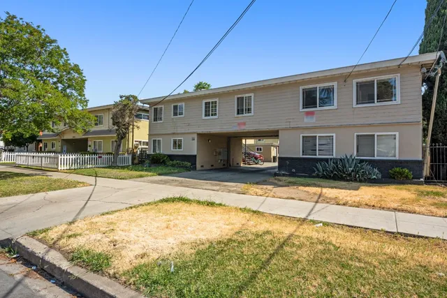 a view of a house with swimming pool