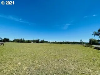 a view of an ocean and city