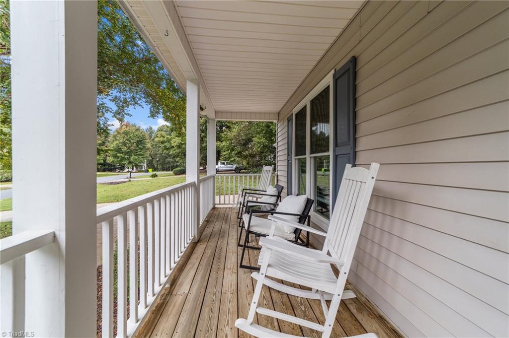 8202 Daltonshire Drive Oak Ridge, NC 27310 - Photo 6 of 49 Rocking chair front porch