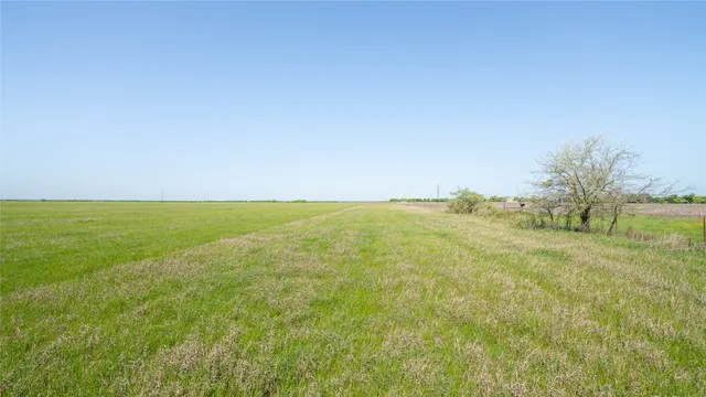 a view of a lake view with a big yard