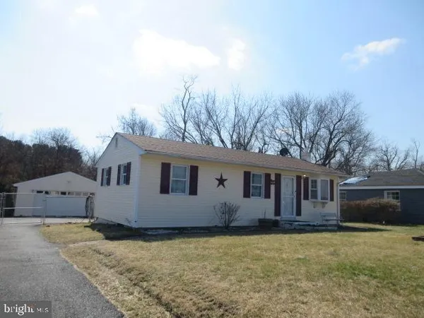 front view of house with a yard