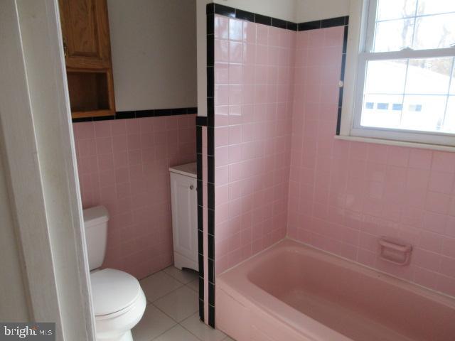 344 Cayots Corner Road Chesapeake City, MD 21915 - Photo 14 of 28 a white toilet sitting next to a bath tub