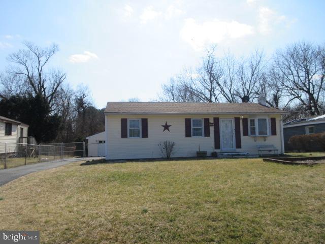 344 Cayots Corner Road Chesapeake City, MD 21915 - Photo 2 of 28 a house that is sitting in the grass with large trees