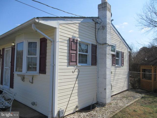 344 Cayots Corner Road Chesapeake City, MD 21915 - Photo 4 of 28 a view of a house with a door and wooden floor