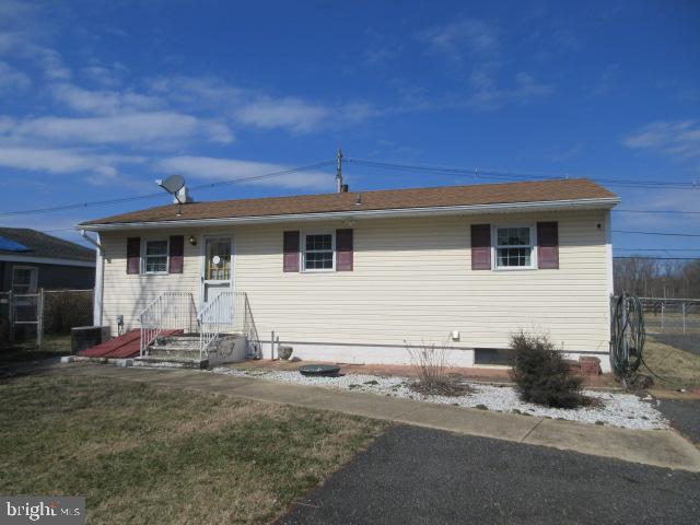 344 Cayots Corner Road Chesapeake City, MD 21915 - Photo 5 of 28 a front view of a house with a yard