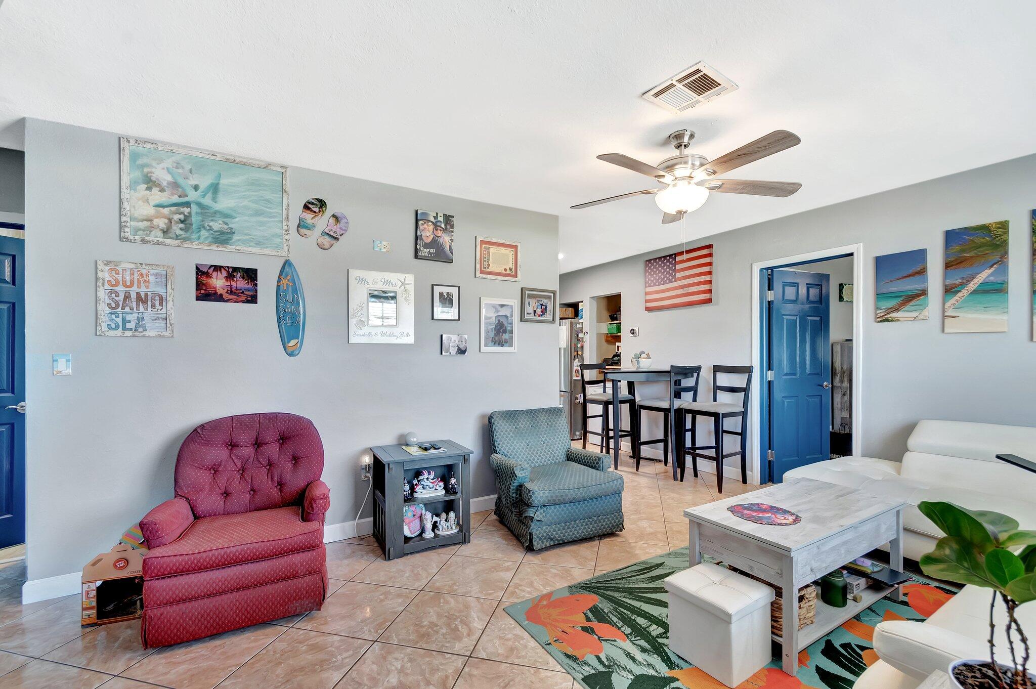 3890 Ocala Road Lake Worth, FL 33462 - Photo 18 of 29 a living room with furniture and wooden floor