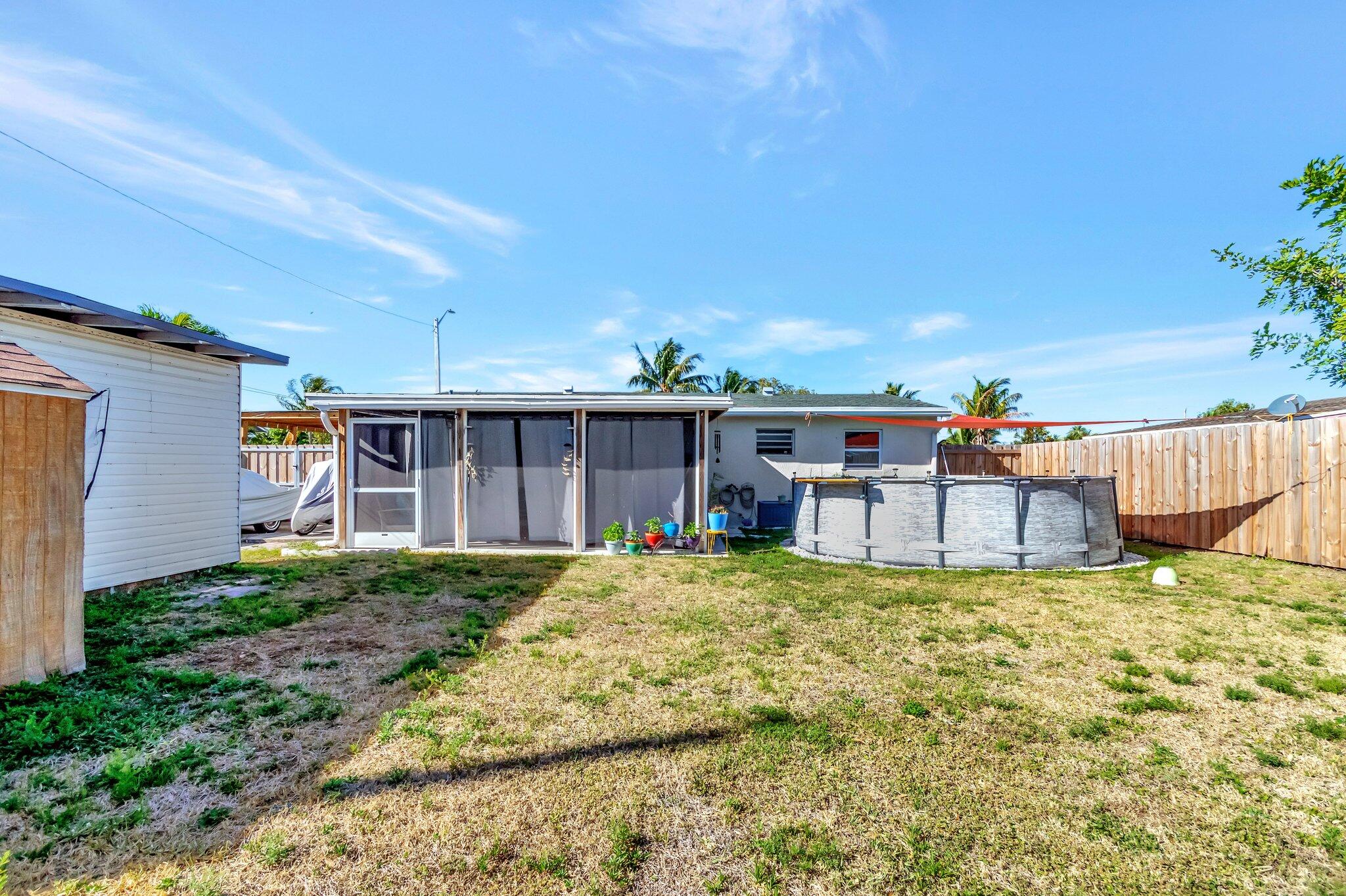 3890 Ocala Road Lake Worth, FL 33462 - Photo 24 of 29 a house view with a seating space