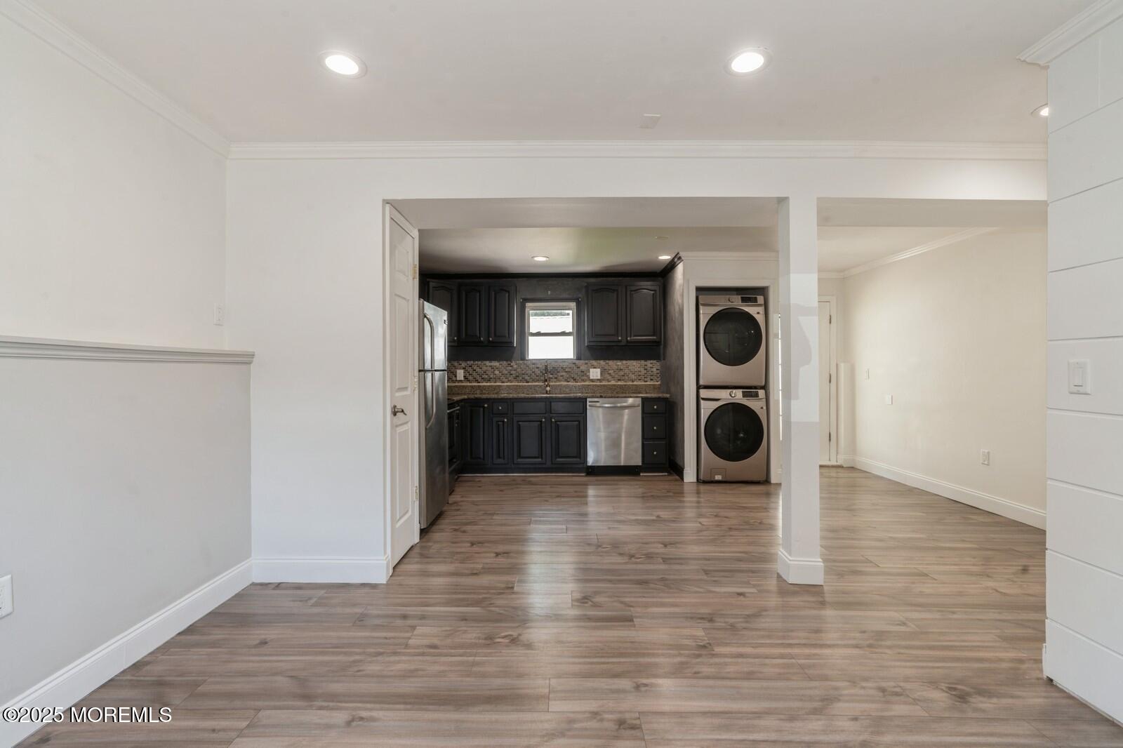 52 Atlantic Street, Unit 2 Highlands, NJ 07732 - Photo 15 of 35 a view of a kitchen with a sink and a stove top oven