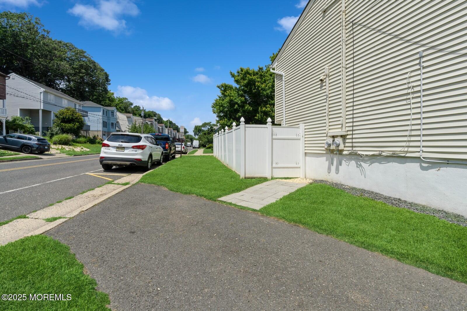 52 Atlantic Street, Unit 2 Highlands, NJ 07732 - Photo 30 of 35 a view of a back yard of the house